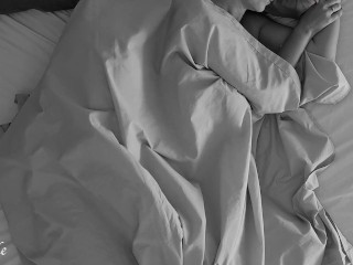 Night vision home video of an amateur couple having romantic sex in bed