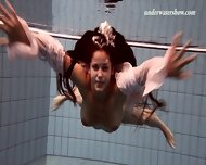 Paulinka and Brizgina swim naked and sexy