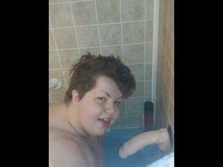 Cinni pulls a fat dildo off the wall with her tight pussy
