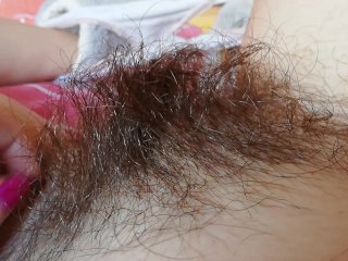 Playing with my thick hairy bush big clit pussy close up