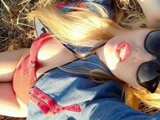 A sunny day & a gorgeous milf sunbathing in the field feeling sexy!
