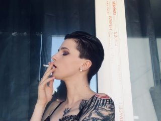 hot girl in red lipstick smoke on the balcony only in bra