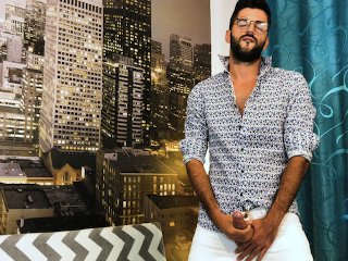 Good Looking Guy Pose and Jerk His Big Dick With Clothes On