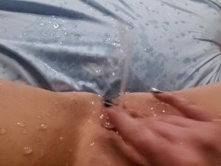 Fingering pussy, huge squirt leaves puddle in amateur bed