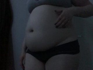 Feedee plays with empty and full bellyplay