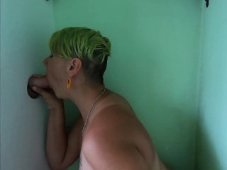 Cock sucking through gloryhole and swallow