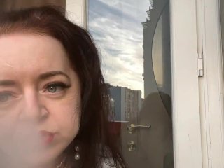 Vaping from sexy Mistress Lara in a nightie