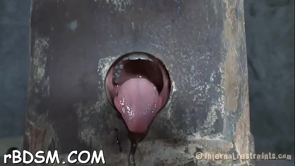 Clamped up sweetheart gets a hook in her anal with toy t.
