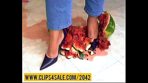 Watermelon crushing under high heels