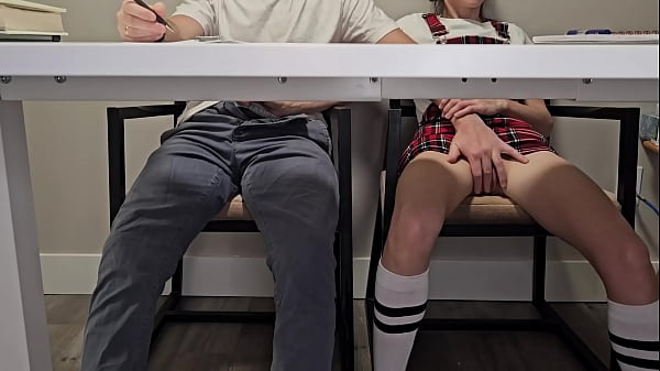 Students entertaining during boring lecture