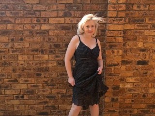 Striptease and Piss by chubby Mature naked blonde outside in the garden courtyard