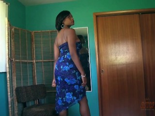 Classy black woman slowly undresses and massages her large tits before toying her horny wet pussy.