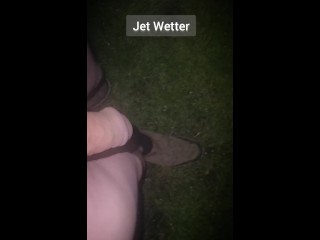 Nonchalant handsfree outdoor peeing in the back garden