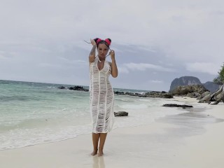 Monika Foxxx masturbates with a big dildo on a white sand beach